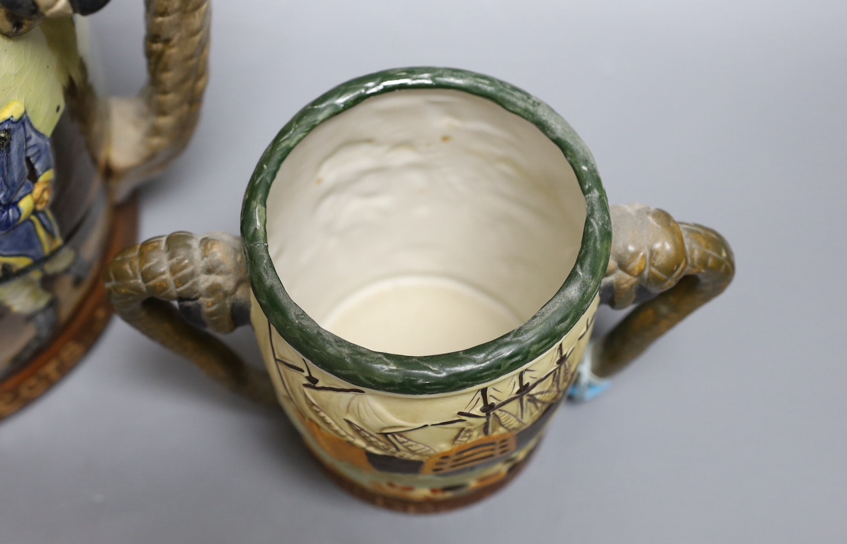A Royal Doulton Nelson commemorative loving cup, no.453/600, 27cm tall, together with another cup